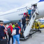 passengers boarding a reliable Lufthansa plane