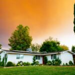 first time buyer mortgage no deposit - photo of a house with a sunset in the background