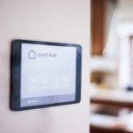 Smart home tablet on a wall